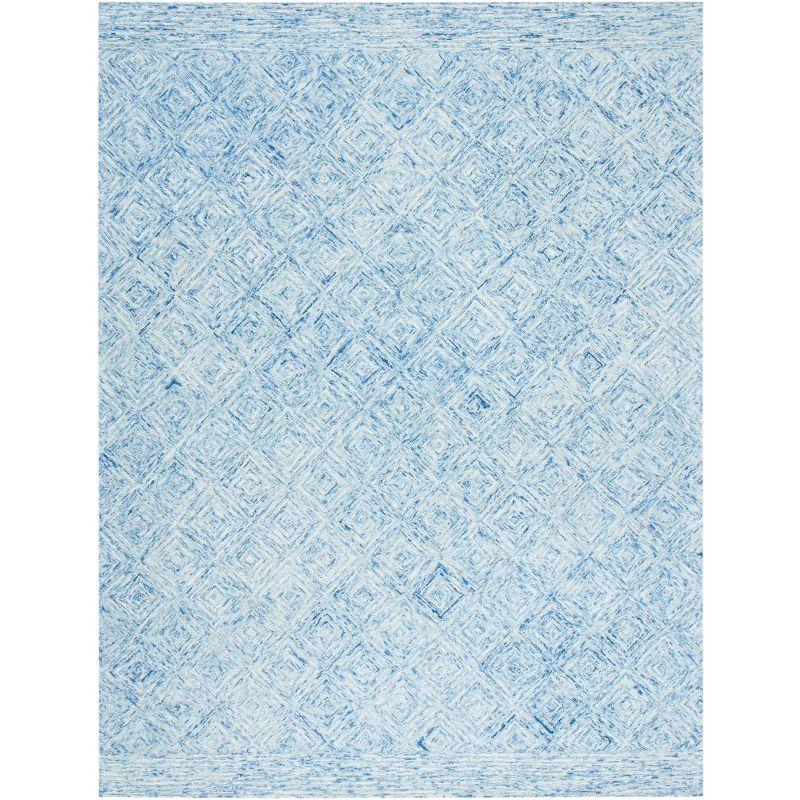 Ikat IKT704 Hand Tufted Area Rug - Blue - 8'x10' - Safavieh.