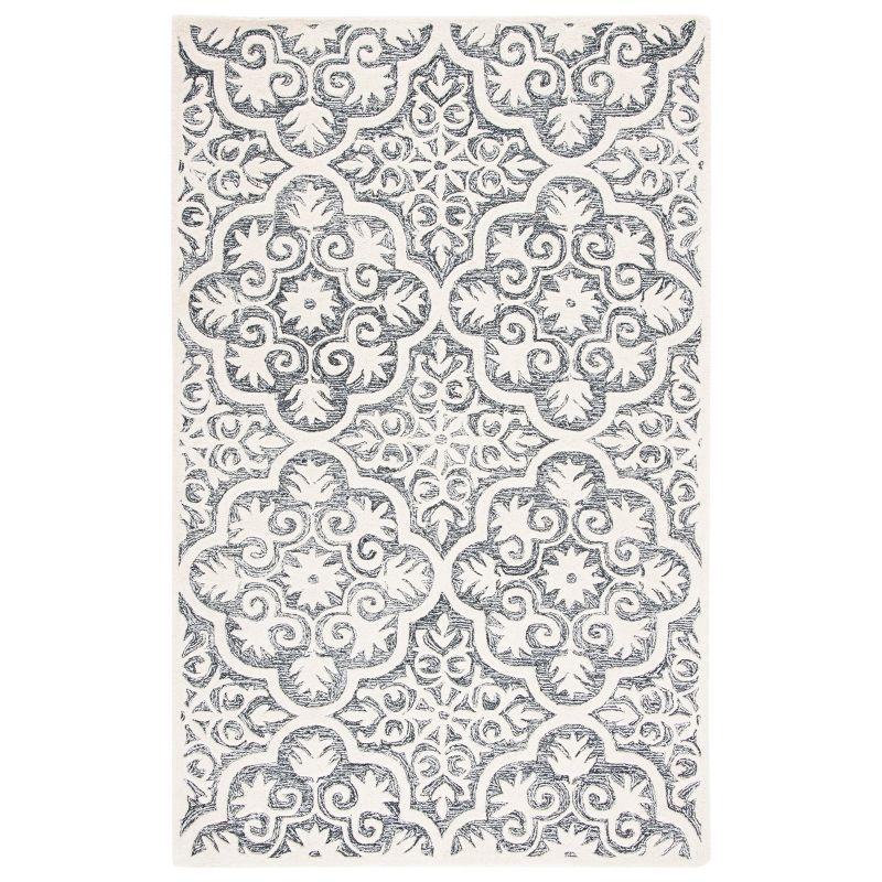 Metro MET859 Hand Tufted Indoor Area Rug - Black/Ivory - 8'x10' - Safavieh