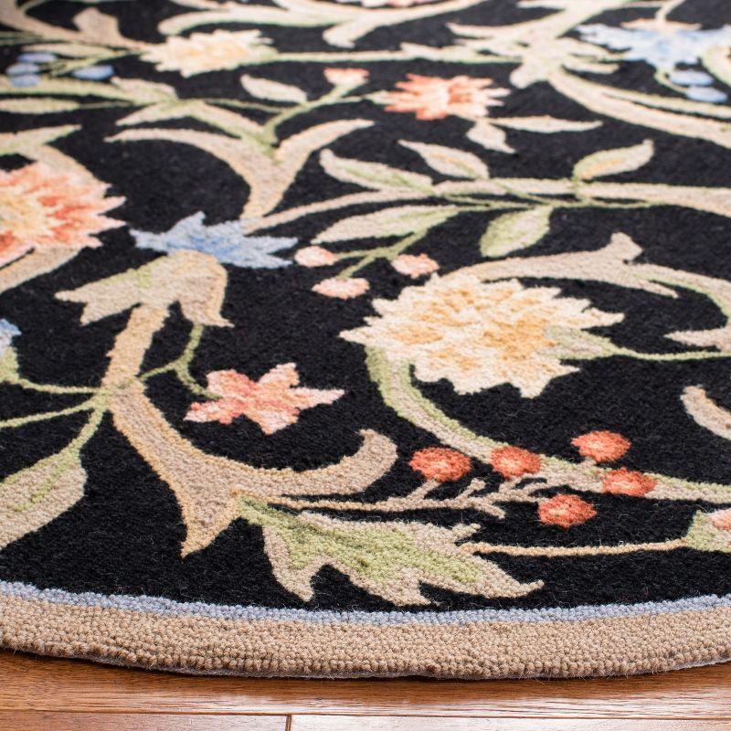 Handmade Black Floral Wool Round Tufted Rug, 7'