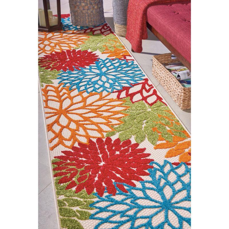 Tropical Green Floral Bloom 27'' x 120'' Synthetic Outdoor Rug