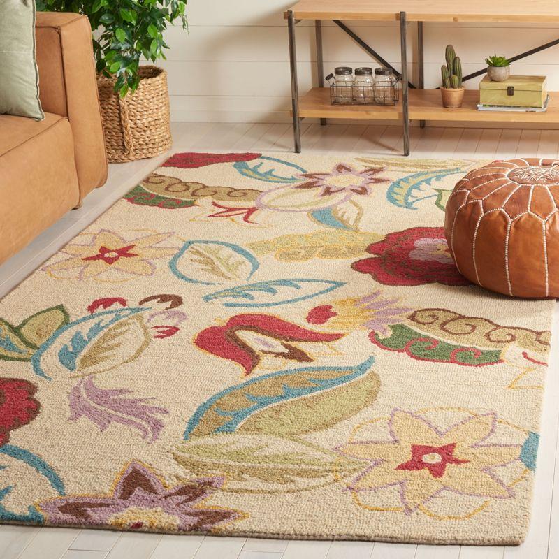 Hand-Knotted Red Floral Wool Area Rug - 5' x 8'