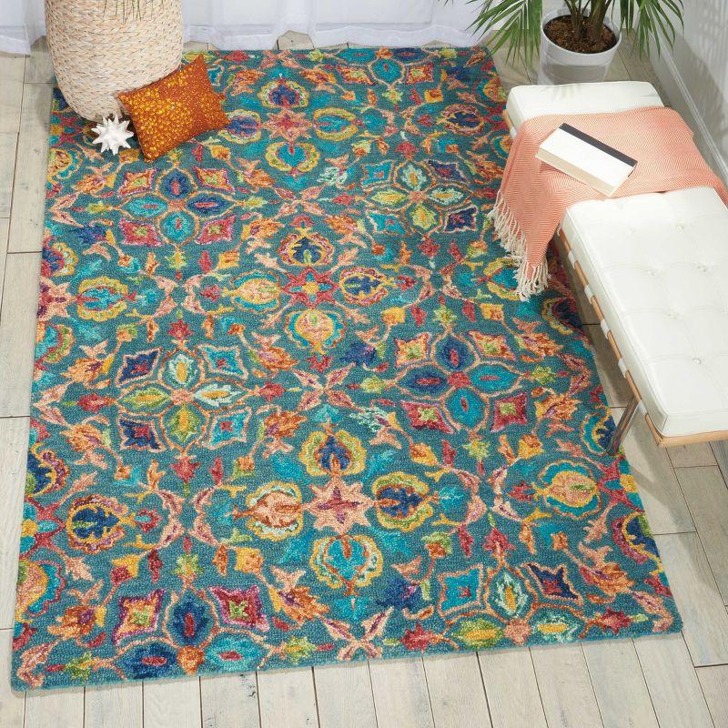 Handmade Teal Floral Wool Area Rug 5' x 7'