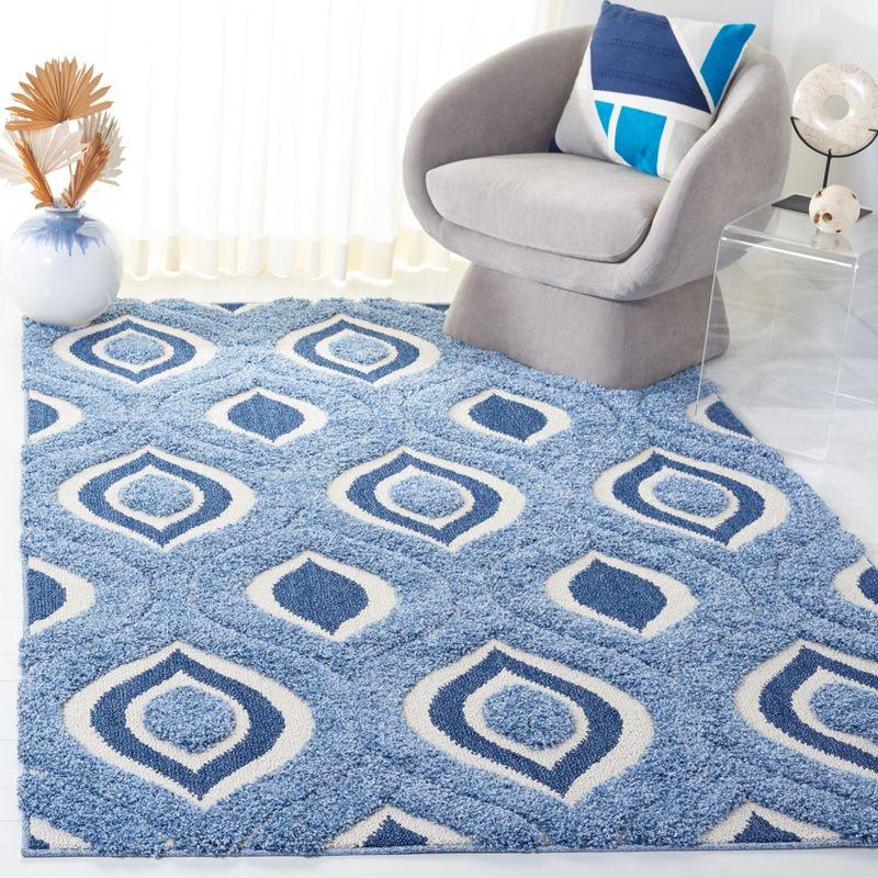 Ivory and Blue Geometric Shag Synthetic Area Rug