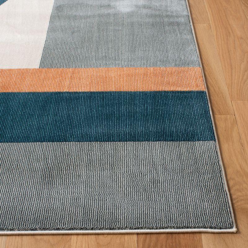 Beige and Dark Teal Abstract Rectangular Stain-Resistant Rug