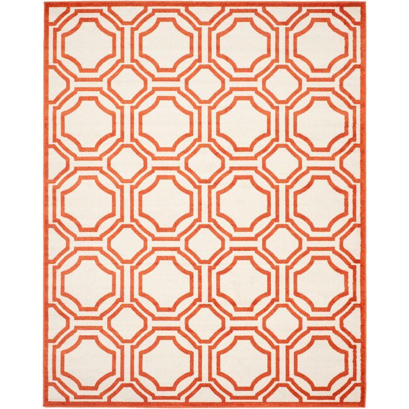 Ivory and Orange Geometric 8' x 10' Stain-Resistant Synthetic Rug