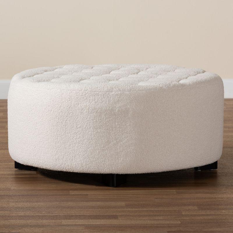 Baxton Studio Athena Modern and Contemporary Ivory Boucle Upholstered and Black Finished Wood Round Ottoman