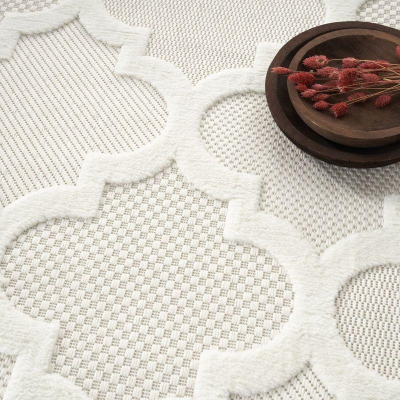 Nourison Easy Care 7' x 10' Ivory/White Indoor/Outdoor Rug