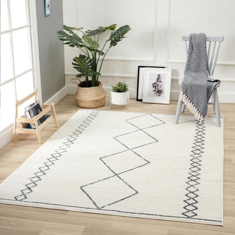 Adilenne Geometric Cream Area Rug
