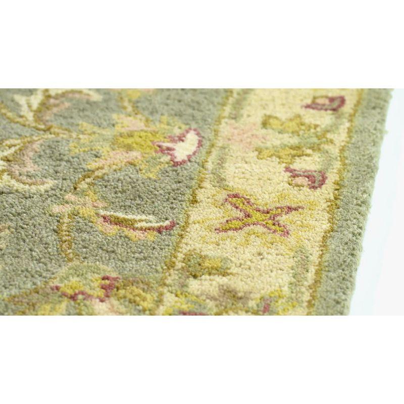 Elegant Antiquity Ivory Wool 27" x 18" Handmade Area Rug