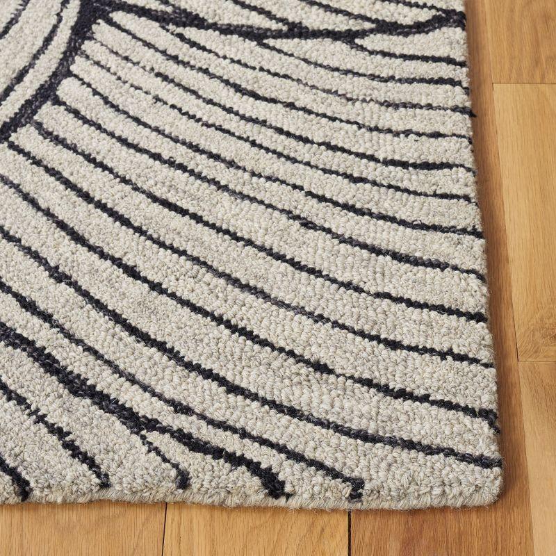 Metro MET451 Hand Tufted Indoor Area Rug - Black/Ivory - 4'x6' - Safavieh