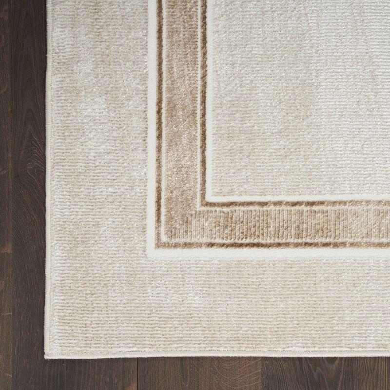 Ivory Cream Geometric 8' x 10' Easy-Care Synthetic Area Rug