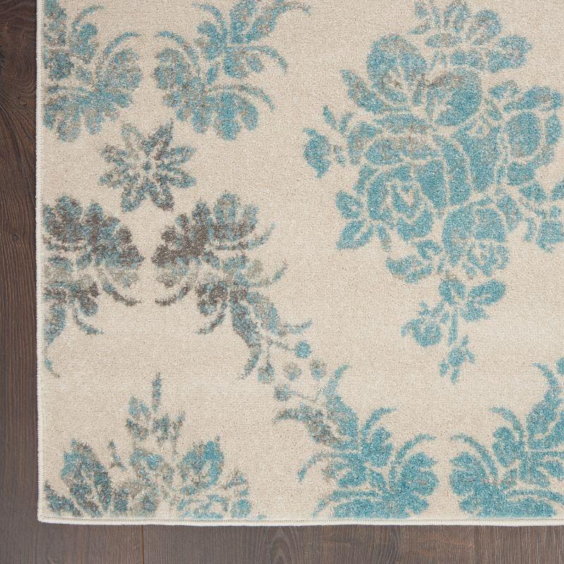 Elegant Ivory and Turquoise Floral Synthetic 6' x 9' Area Rug