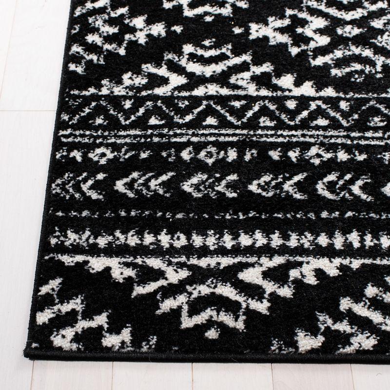 Ivory and Black Geometric Square Synthetic Area Rug