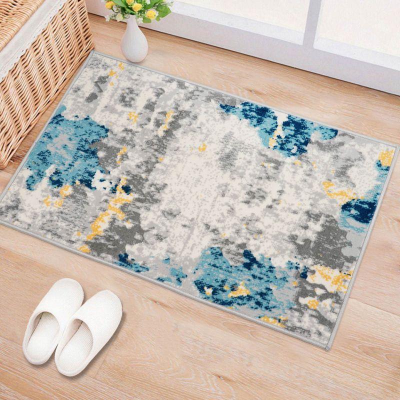 Abstract Cream Washable Synthetic 2' x 3' Area Rug