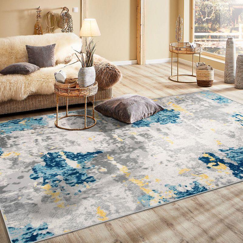 Cream and Blue Abstract Synthetic 5' x 7' Area Rug