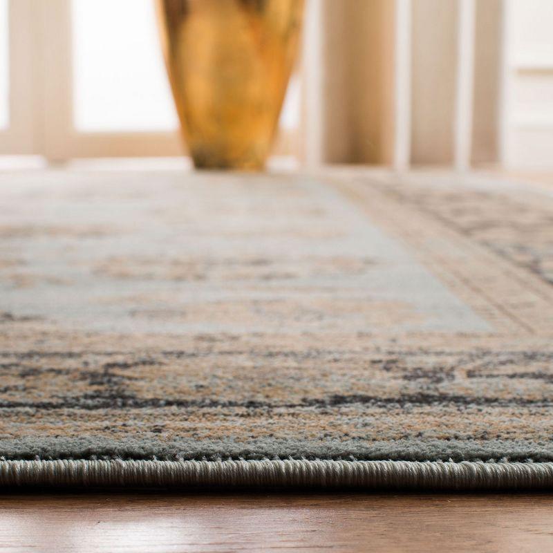 Vintage VTG575 Power Loomed Area Rug Light Blue / Brown 6'-7" X 9'-2" - Safavieh.