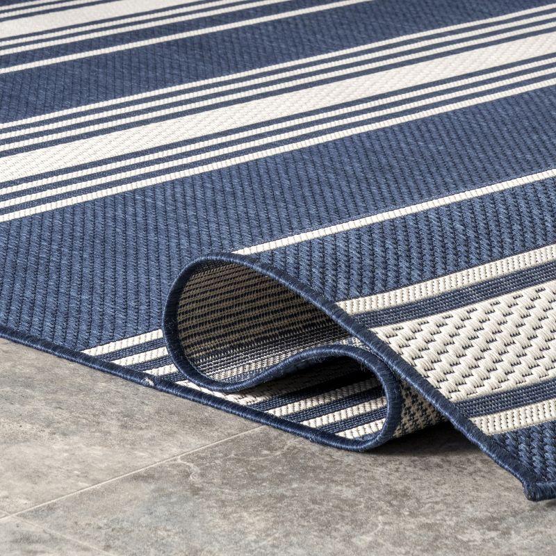 Navy Striped Synthetic 5' x 8' Easy-Care Indoor/Outdoor Rug