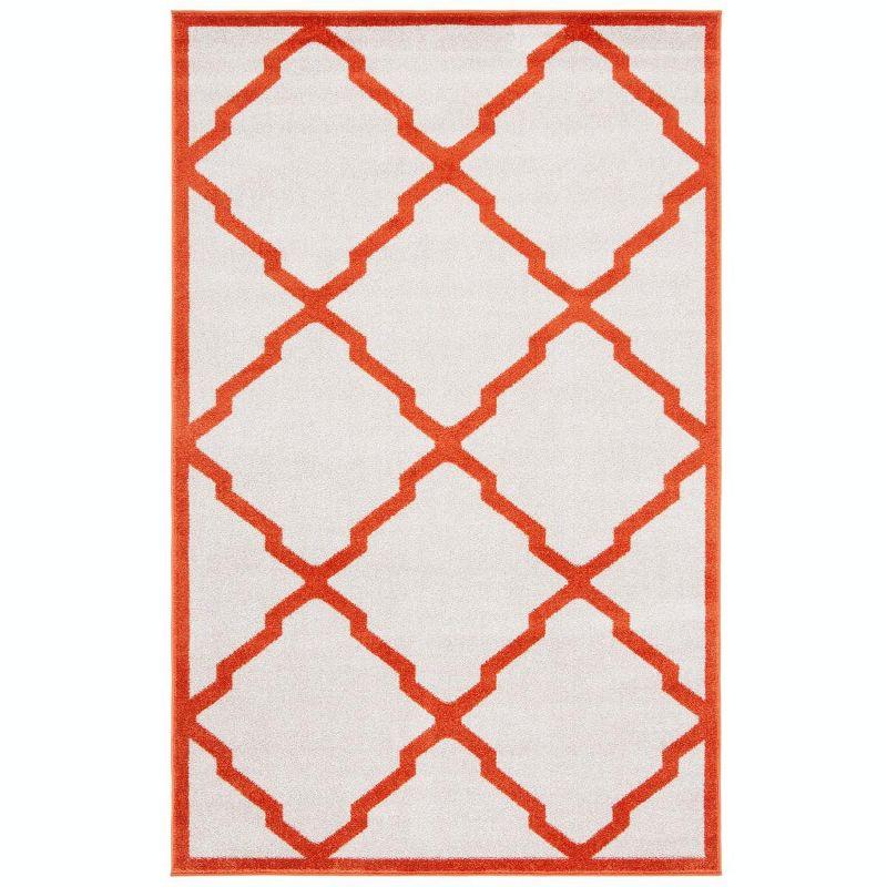 Beige & Orange Geometric Round Synthetic Area Rug 6' x 9'