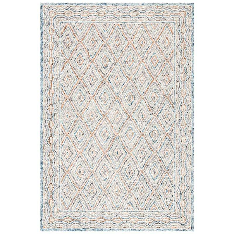 Capri CPR217 Hand Tufted Area Rug - Blue/Rust - 4'x6' - Safavieh.
