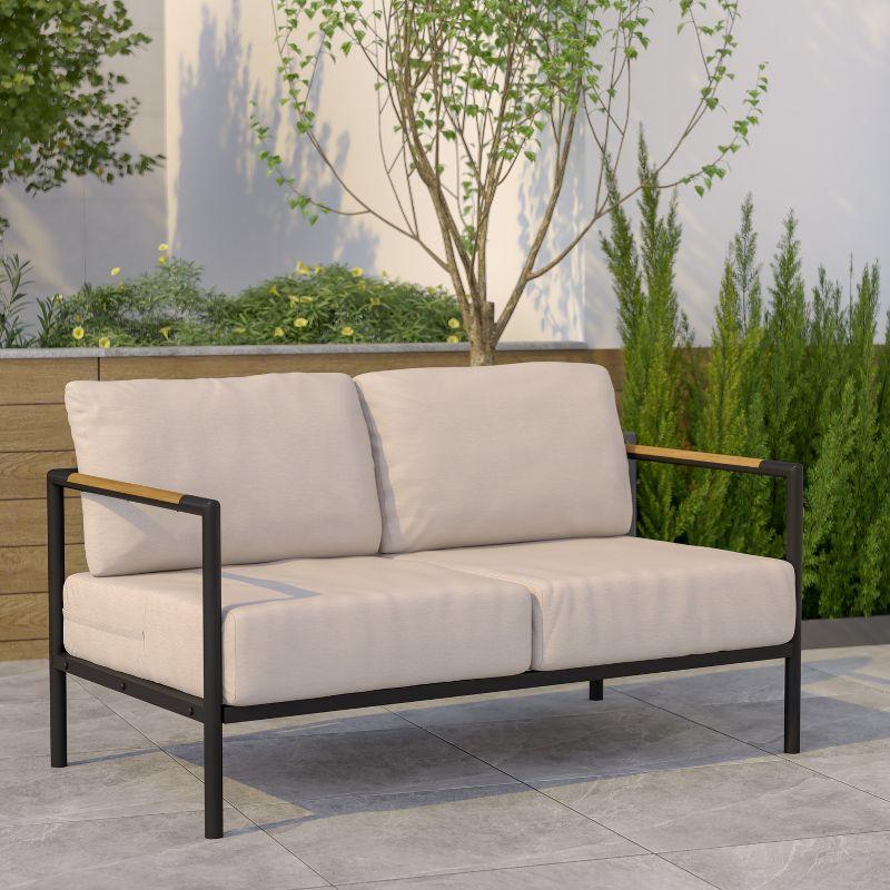 Emma and Oliver Black Aluminum Frame Loveseat with Teak Arm Accents and Beige Cushions