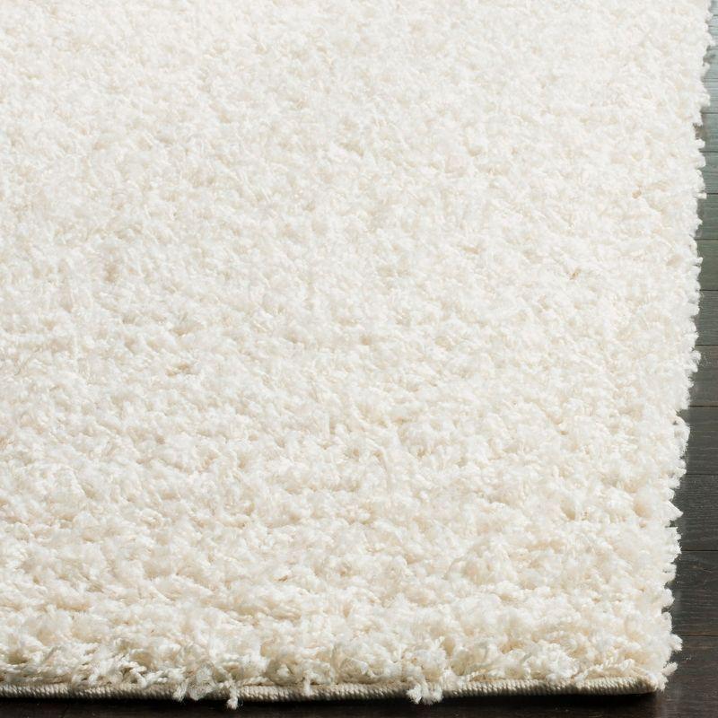 Plush White Synthetic 27'' Hand-Knotted Shag Runner Rug