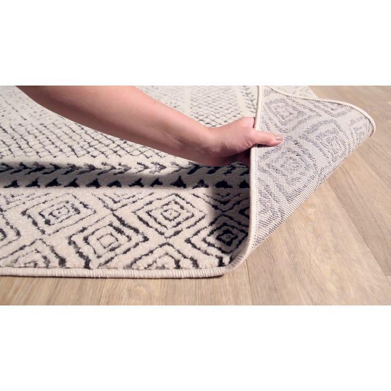 Global Oasis 9' x 12' Rectangular Gray Spot Synthetic Rug