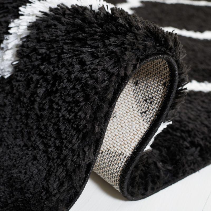 Tahoe Shag THO675 Power Loomed Area Rug - Black/White - 6'7"x8'7" - Safavieh.