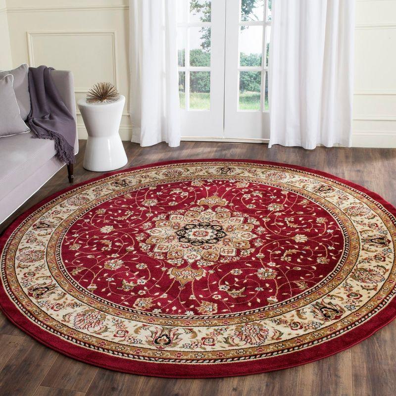 Elegant Lyndhurst Floral Red/Ivory Round Synthetic Rug, 8' x 8'