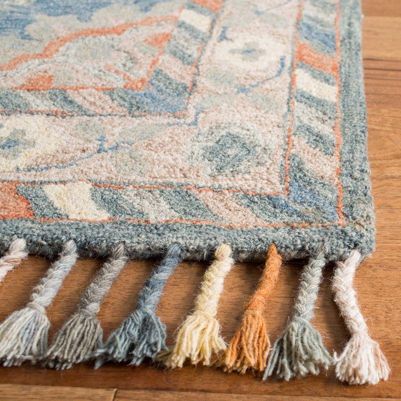 Aspen W/ Tassels APN123 Hand Tufted Indoor Area Rug - Blue/Rust - 6'x9' - Safavieh