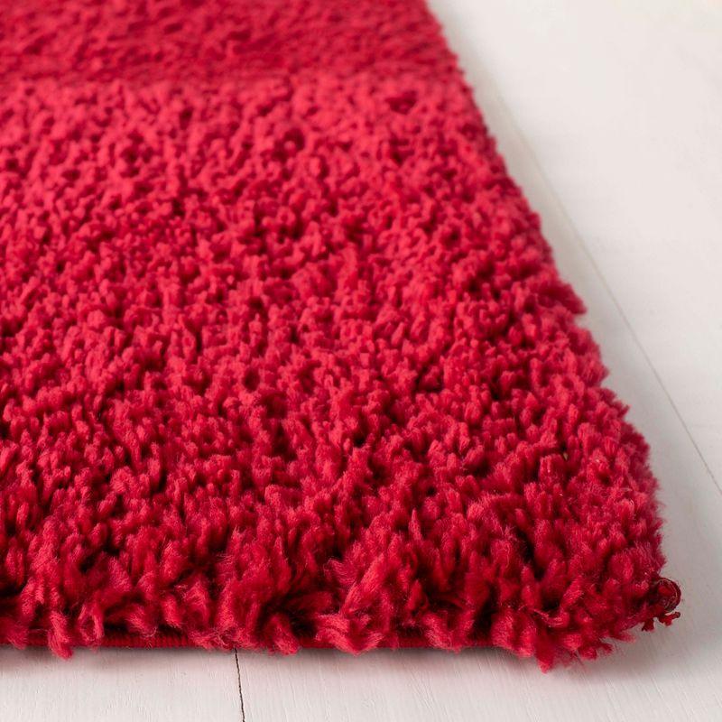 Luxe Comfort Red Shag 4' x 6' Hand-Knotted Synthetic Area Rug