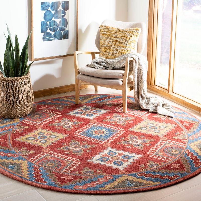 Handmade Rustic-Chic Red and Blue Wool Round Rug