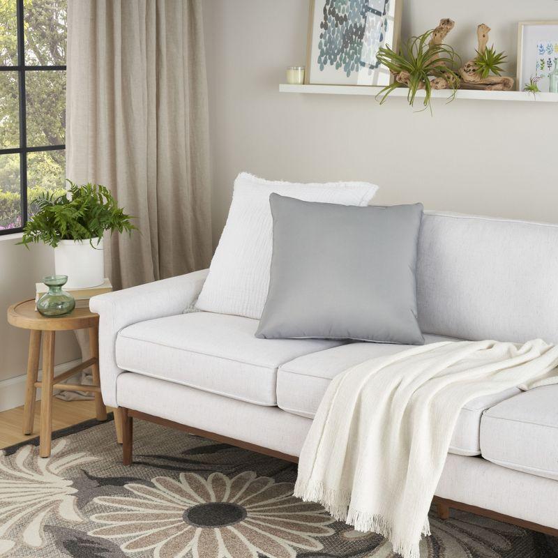 Mina Victory Aloha Solid Reversible 20" x 20" Indoor Outdoor Throw Pillow Grey
