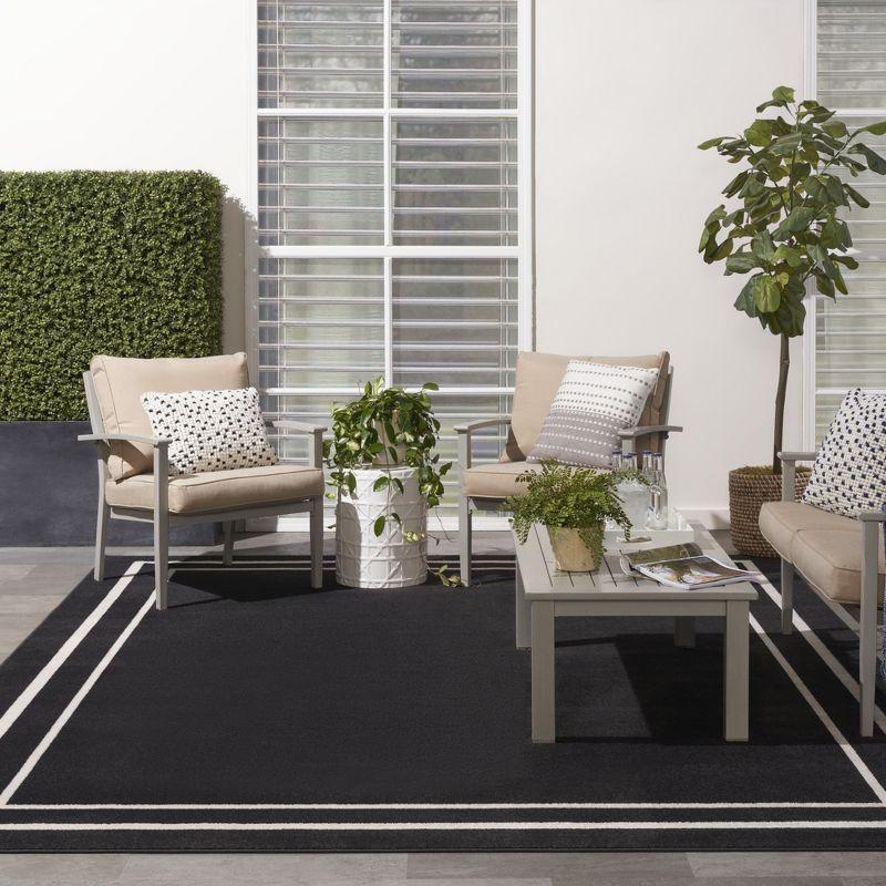 Nourison Essentials Bordered Indoor Outdoor Area Rug