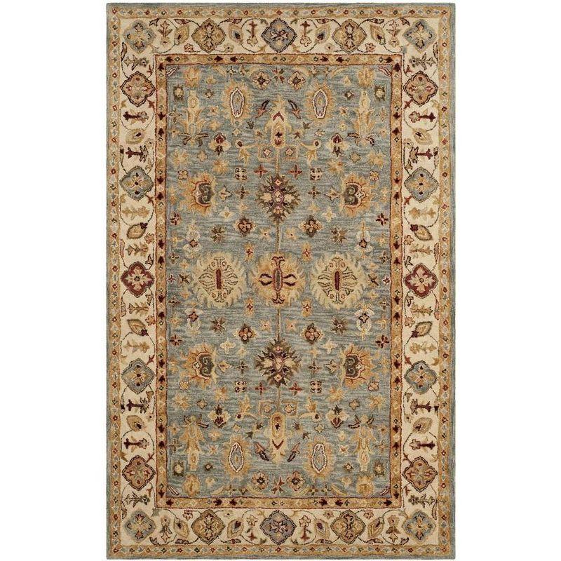 Handmade Blue Wool 6' x 9' Tufted Area Rug