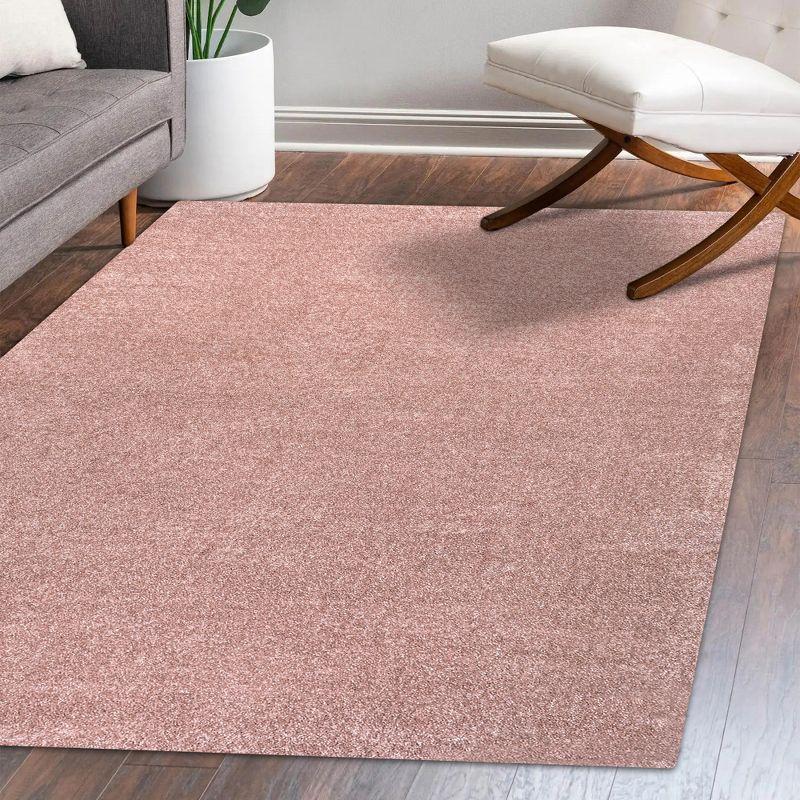 Pink Reversible Solid Synthetic Area Rug