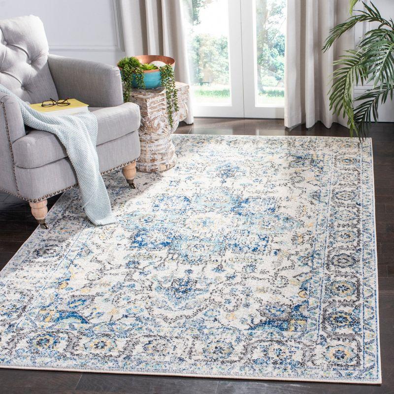 Turquoise and Ivory Medallion Synthetic Area Rug