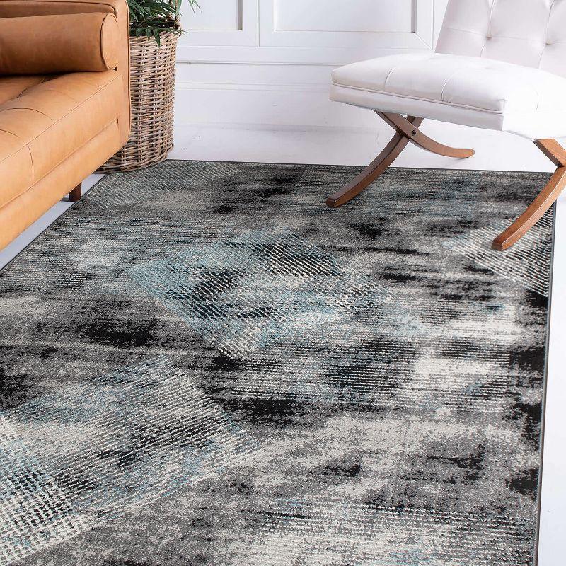 Reversible Geometric Black Synthetic 5' x 7' Area Rug