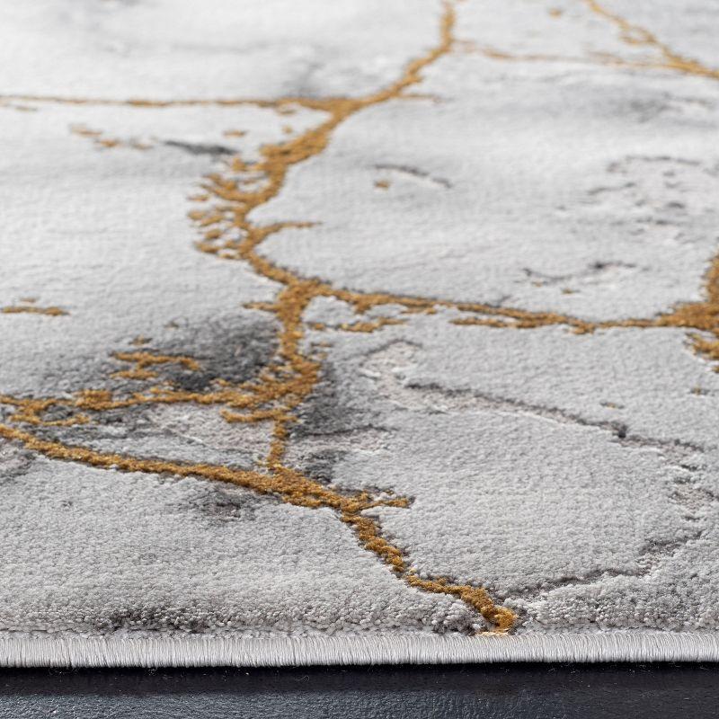 Abstract Swirls Grey and Gold 9' x 12' Synthetic Reversible Rug