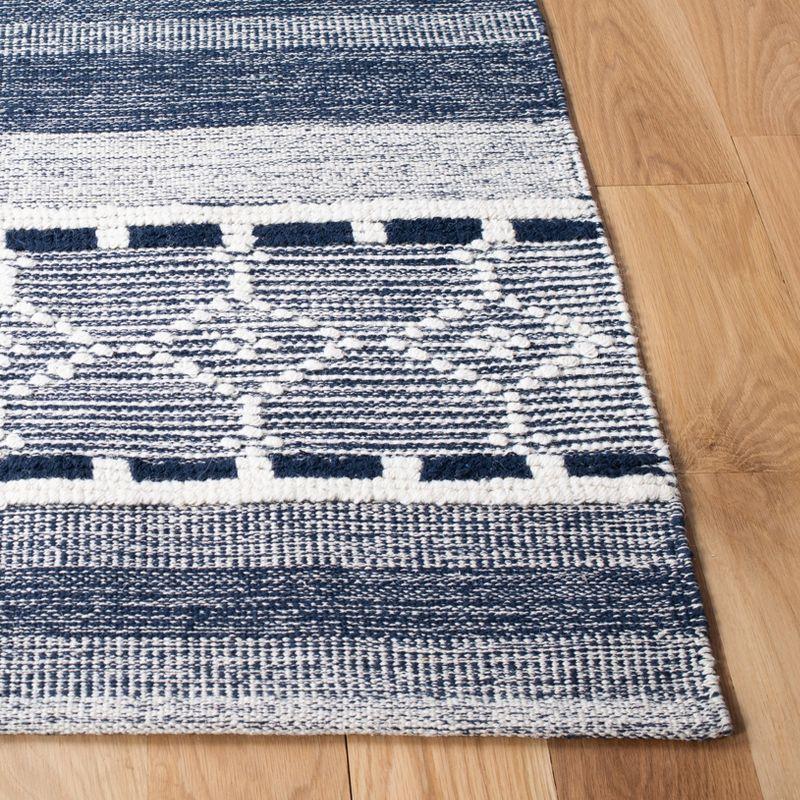 Ivory and Navy Handmade Kilim Wool Area Rug with Cowhide Accents