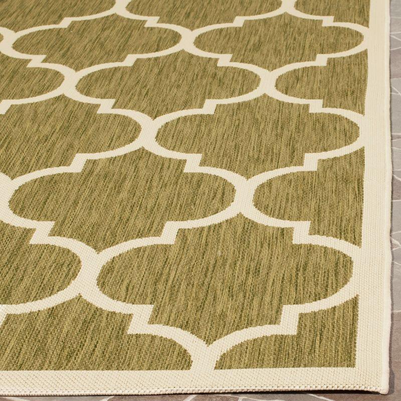 Black and Beige Synthetic Stain-Resistant Indoor/Outdoor Rug