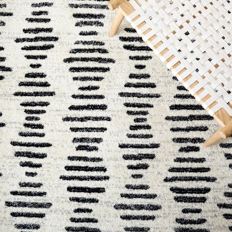 Ivory & Black Boho-Chic Hand-Knotted Area Rug - 5'5" x 7'7"