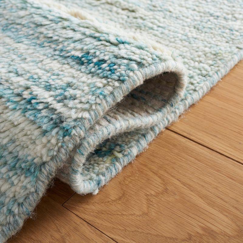 Turquoise and Ivory Handmade Wool Shag Rug, 4' x 6'