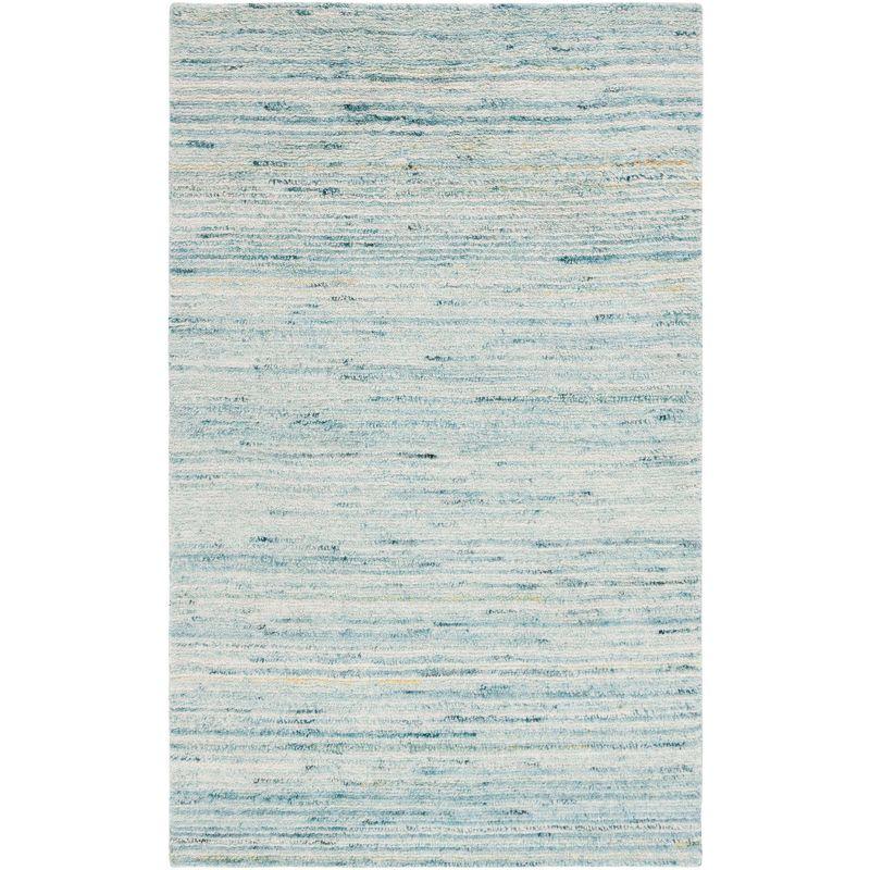 Turquoise and Ivory Handmade Wool Shag Area Rug, 3' x 5'