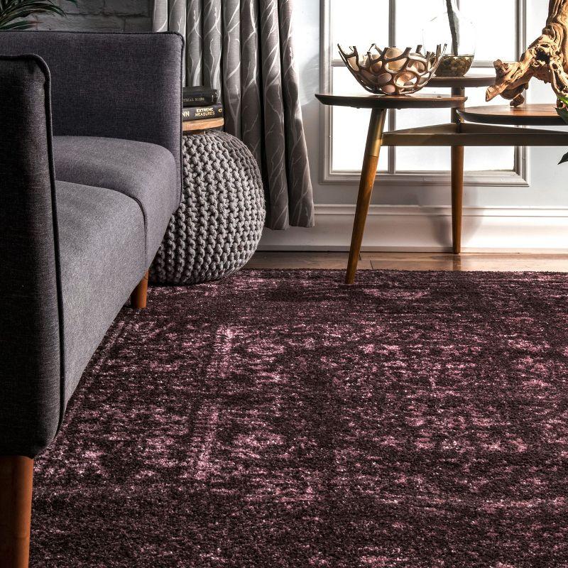 Elegant Burgundy 4' x 6' Reversible Synthetic Area Rug