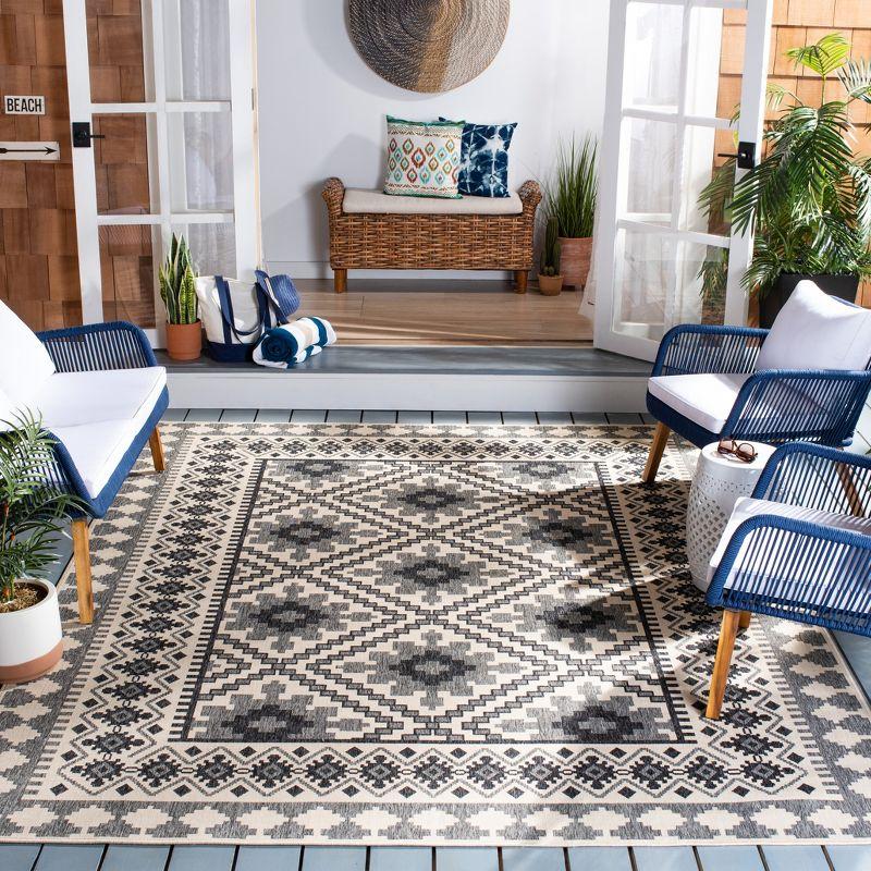 Ivory and Slate Southwestern Synthetic Indoor/Outdoor Area Rug