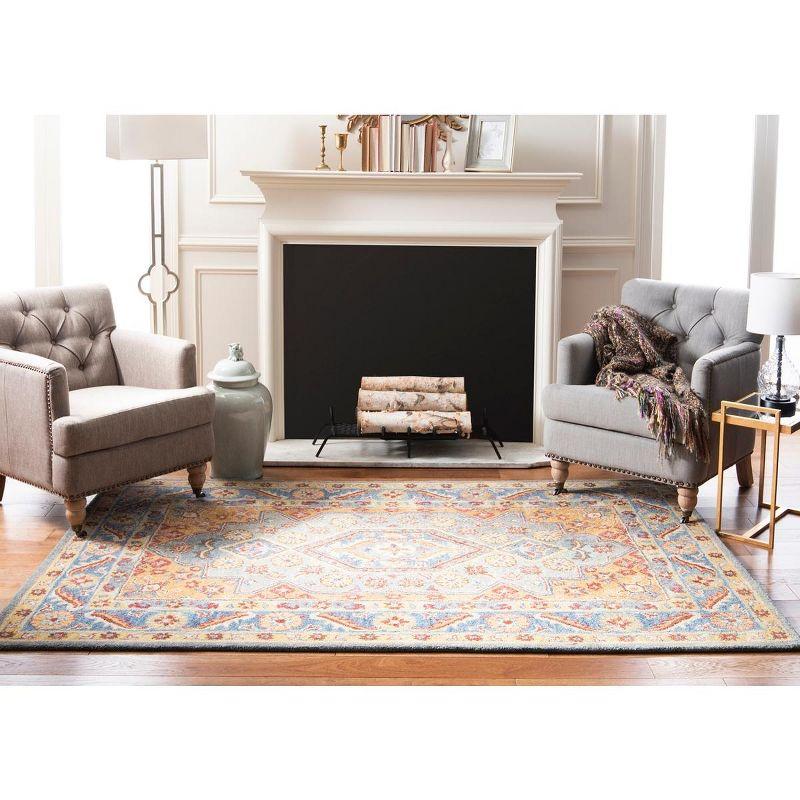 Antiquity AT504 Hand Tufted Area Rug - Blue/Gold - 5'x8' - Safavieh.