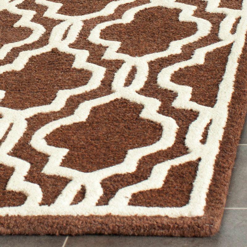 Safavieh Dark Brown and Ivory Hand-Tufted Wool Rug