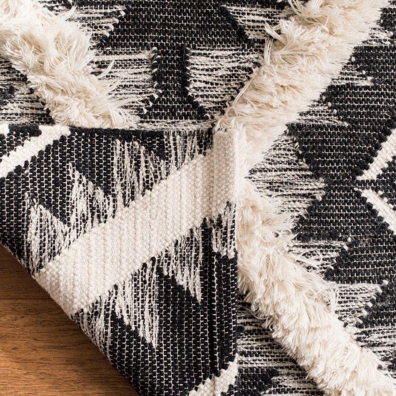 Handwoven Black and Ivory Wool Tribal Area Rug 6' x 9'