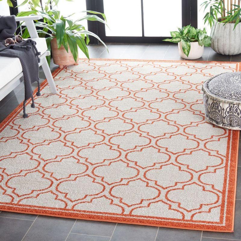 Ivory & Orange Geometric Easy-Care Synthetic Area Rug