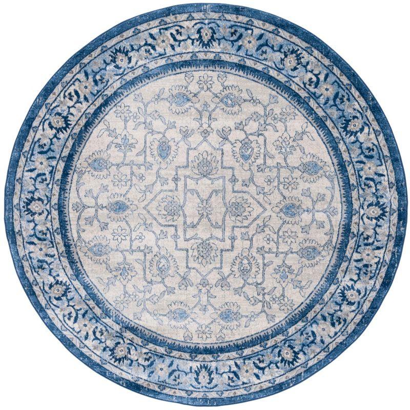 Ivory and Blue Round Hand-knotted Synthetic Rug